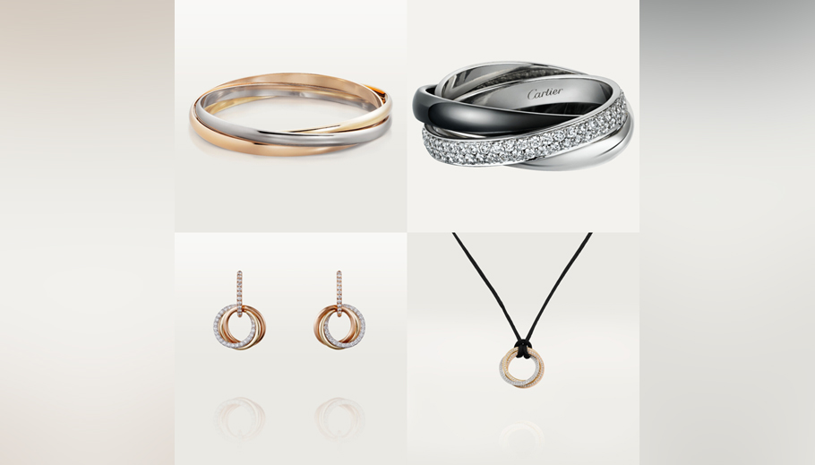 Вариации коллекции Cartier Trinity: серьги, браслет, колье, кольцо